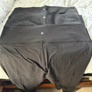 Three pairs size 18 Lululemon leggings.